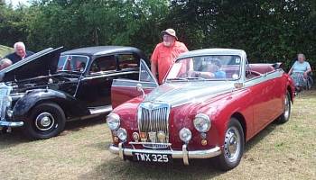 a beautiful two-tone MG - model and year anyone?