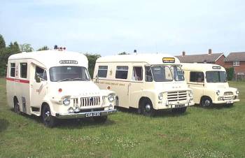 left to right a Bedford (date & model unknown), a Morris (date and model unknown) and a Bedford CA series (year unknown)