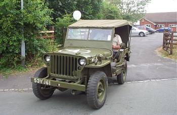 1944 Ford -manufactured Willys Jeep - apologies to Landy fans for use of the four-letter J-word.    Must have enjoyed the day judging from the balloon!